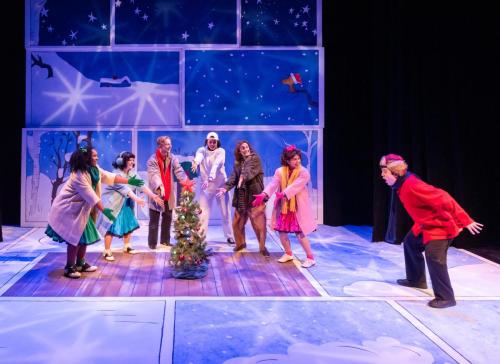 Brad Lo Walker with Chloe Michele, Karin Terry, Kooper Campbell, Keola Kapulani Holt, Alexander Kilian, and Alegra Batara in A Charlie Brown Christmas at Taproot Theatre. Photo by Robert Wade Photography.