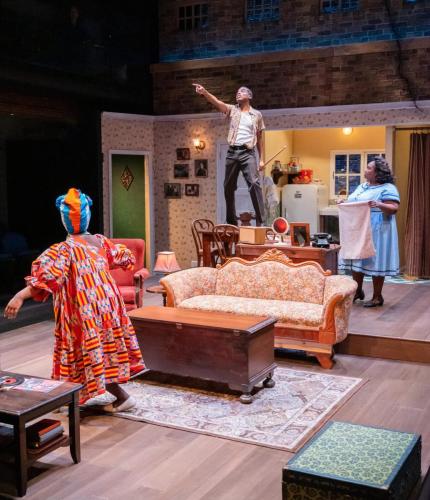Deja Culver, Arlando Smith, and Shermona Mitchell in A Raisin in the Sun at Taproot Theatre. Photo by Robert Wade.